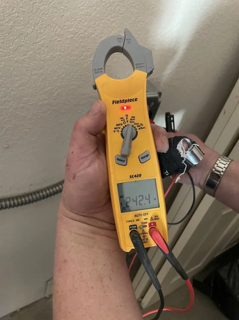 Voltage testing with clamp meter during Circuit Breaker Repair in Hanover